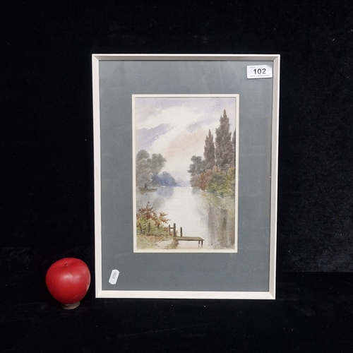 102 - A 1927 watercolour on paper painting. Features a riverside landscape with a figure fishing from a bo... 