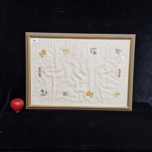 90 - A vintage embroidery on linen, featuring daffodils, lavenders and shamrock leaves. Housed in a woode... 