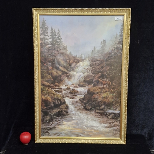97 - A large print titled 'Stag at a waterfall' by Elizabeth Halstead'. Housed in a gilt frame behind gla... 