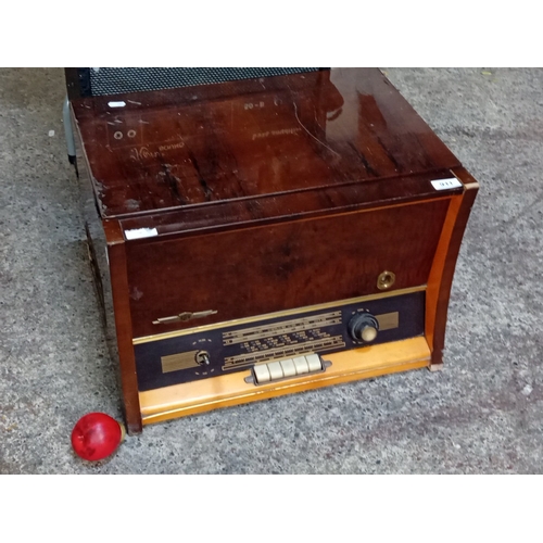 Mid-20th century radiogram in veneered case, the front with multi-band ...