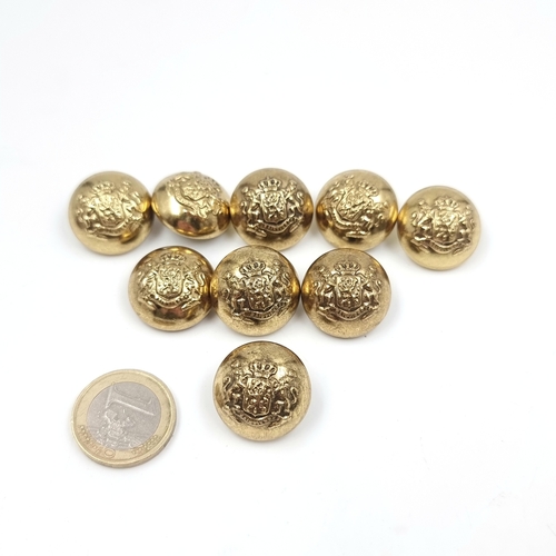 Nine gilt brass British Army general service militaria tunic buttons.