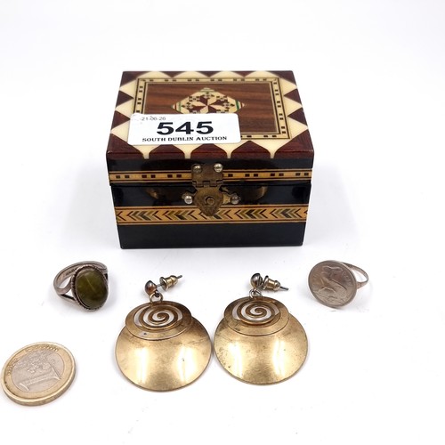 Two Sterling Silver rings including a cabochon Jade example along side a pair of disc drop pendant earrings. Sizes - K & Q. Weight of Silver examples - 9.7 grams