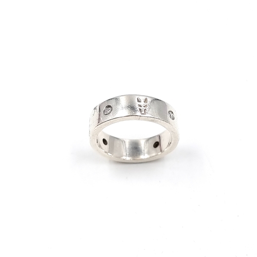 A Sterling Silver gemstone band ring. Size - N, Weight - 6.6 grams.