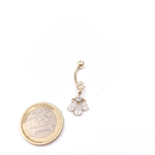 A pretty nine carat gold belly button pendant with gemstone accents. Weight - 1.67 grams.  (Chain not included)