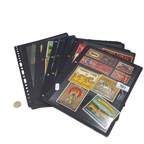 Twelve pages of vintage and antique tiger themed matchbox labels and chromolithograph cut outs. Includes Tamboli Tiger (Jam Match Works, Jamnagar), Bengal Tiger (Cambay Match Works) etc.,