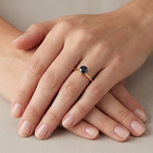 3 - Star Lot : A black diamond crown set ring. Mounted in 9ct gold. Size R 1/2. Weight - 2.45 grams. Est... 