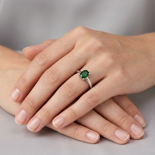24 - A brand new diopside gemstone ring set in Sterling Silver. Size P 1/2. Weight - 1.7
