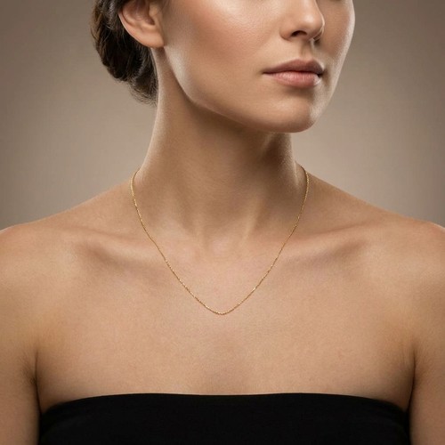 5 - A 9ct gold fine link necklace. Weight - 0.85 grams.