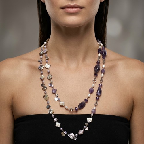 48 - 2 polished stone and pearl necklaces. Each good quality. Total weight - 200 grams. Stones cold to th... 