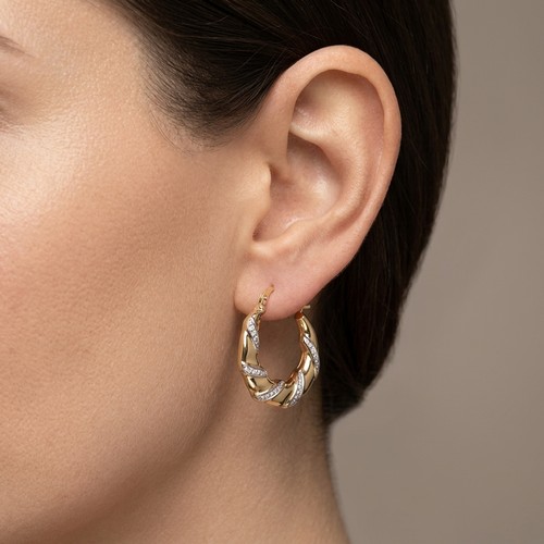 7 - A pair of 9ct gold hoop stud earrings. Weight - 1.1 grams.
