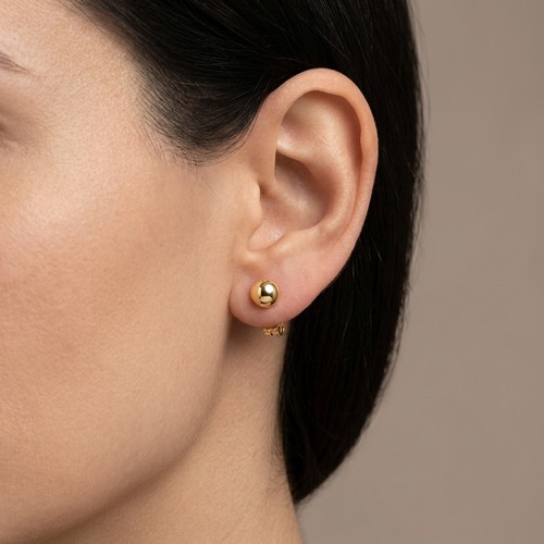 12 - A pair of gold ball stud earrings. Set in 9ct gold. Weight - 0.54 grams.