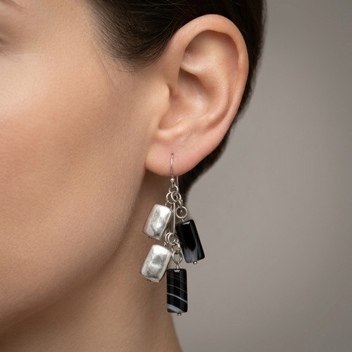 30 - A pair of polished gemstone sterling silver stud earrings. Weight - 12 grams.