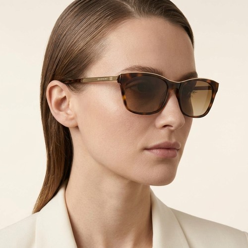 39 - A pair of prescription Givenchy sunglasses. Set with faux tortoise shell frame. Lenses in good clean... 