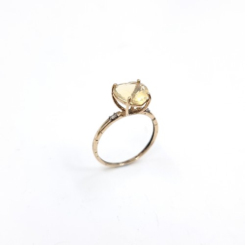 2 - A pretty heart-shaped large citrine gemstone ring. Set in 9ct gold. Size O. Weight - 1.5 grams.