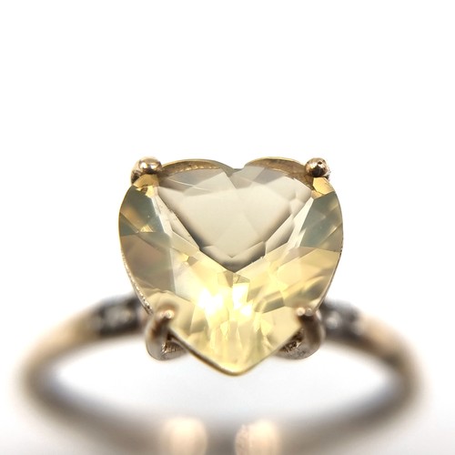 2 - A pretty heart-shaped large citrine gemstone ring. Set in 9ct gold. Size O. Weight - 1.5 grams.