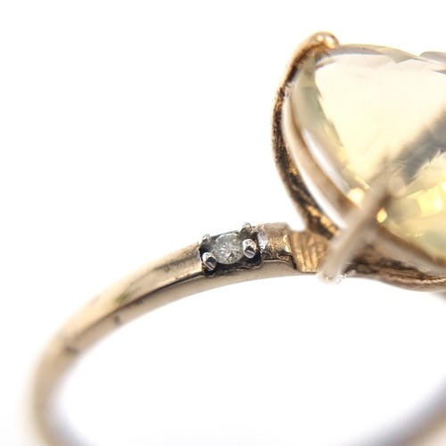 2 - A pretty heart-shaped large citrine gemstone ring. Set in 9ct gold. Size O. Weight - 1.5 grams.