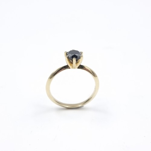 3 - Star Lot : A black diamond crown set ring. Mounted in 9ct gold. Size R 1/2. Weight - 2.45 grams. Est... 
