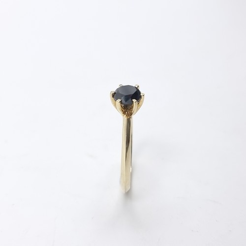 3 - Star Lot : A black diamond crown set ring. Mounted in 9ct gold. Size R 1/2. Weight - 2.45 grams. Est... 
