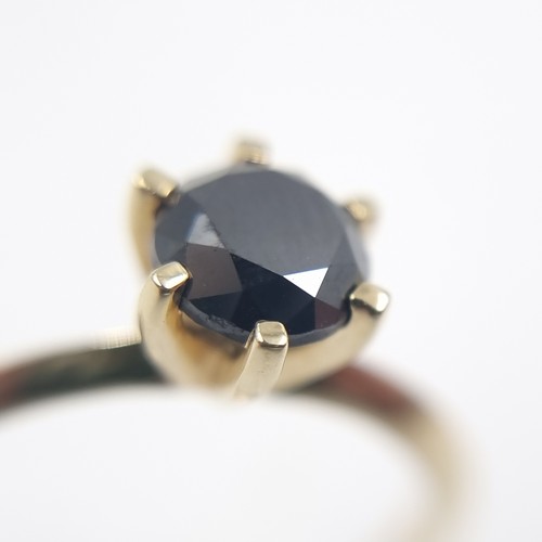3 - Star Lot : A black diamond crown set ring. Mounted in 9ct gold. Size R 1/2. Weight - 2.45 grams. Est... 