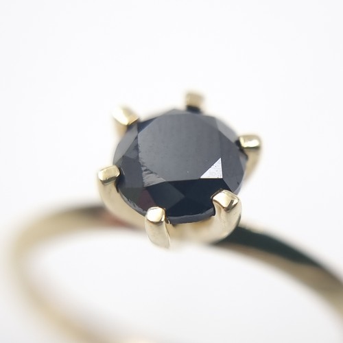 3 - Star Lot : A black diamond crown set ring. Mounted in 9ct gold. Size R 1/2. Weight - 2.45 grams. Est... 