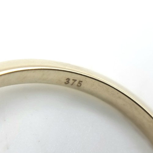 3 - Star Lot : A black diamond crown set ring. Mounted in 9ct gold. Size R 1/2. Weight - 2.45 grams. Est... 