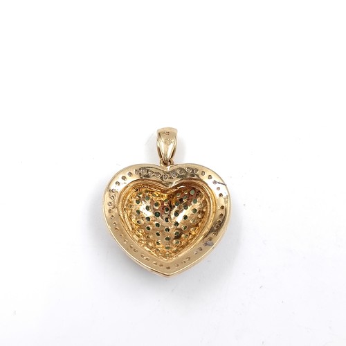 8 - Super star lot: A most attractive heart-shaped emerald and diamond pendant. Set in 9ct gold. Weight ... 