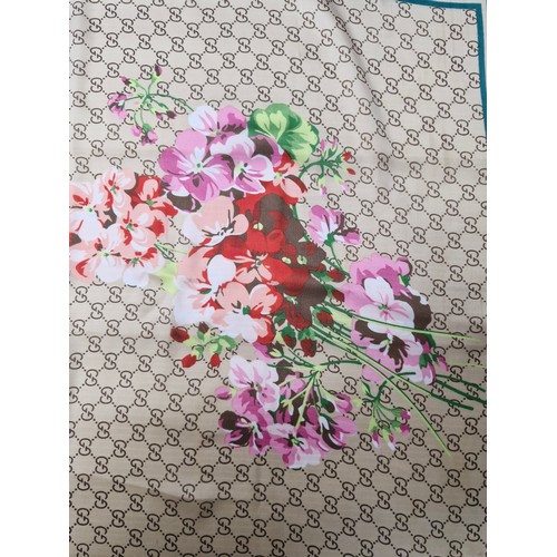 37 - A lovely floral scarf label marked 100% silk.
