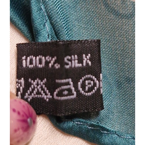 37 - A lovely floral scarf label marked 100% silk.