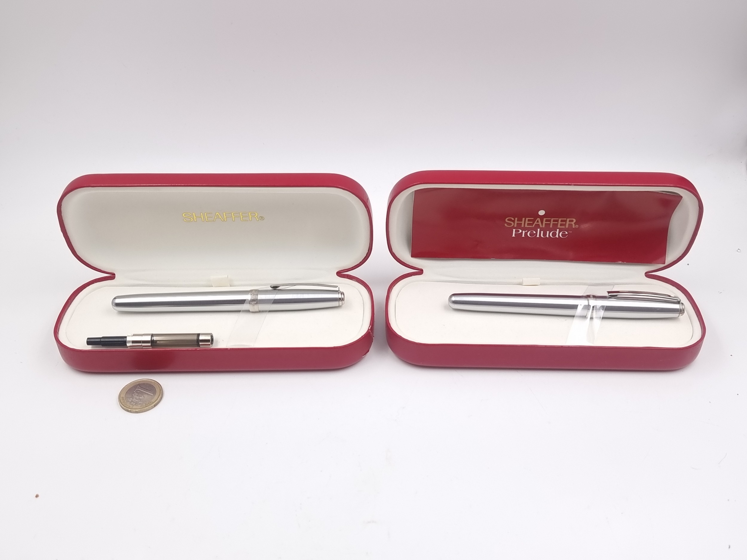 Two as new sheaffer brushed chrome bodied fountain pens. Both housed in ...