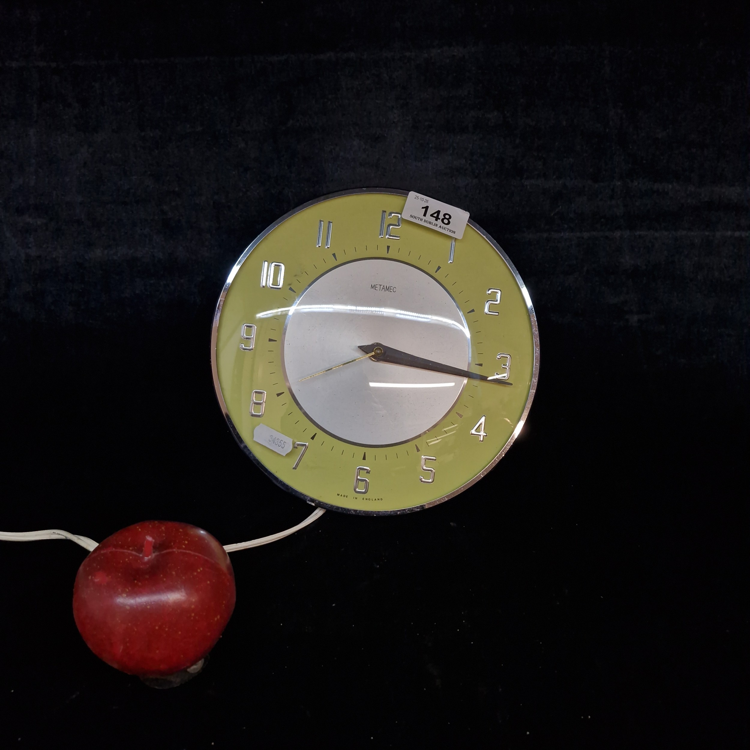 A vintage mid-century electric Metamec wall clock in bright yellow and ...