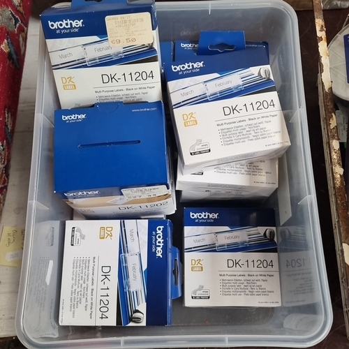 A group of Brother DK printer labels, a boxed Pioneer DVR-S21L optical ...