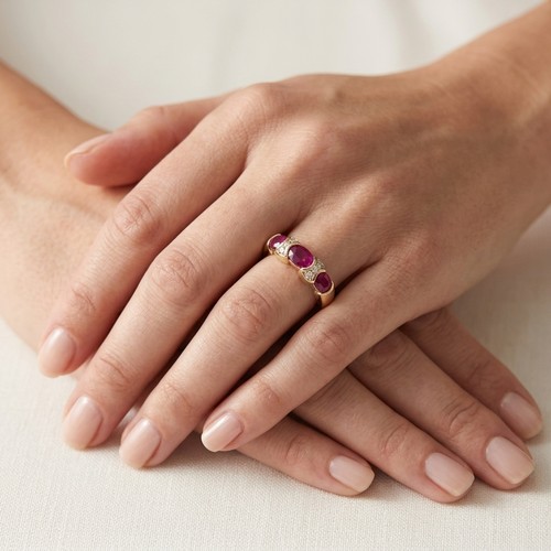 Star Lot: A very attractive ruby and diamond ring set in nine carat ...