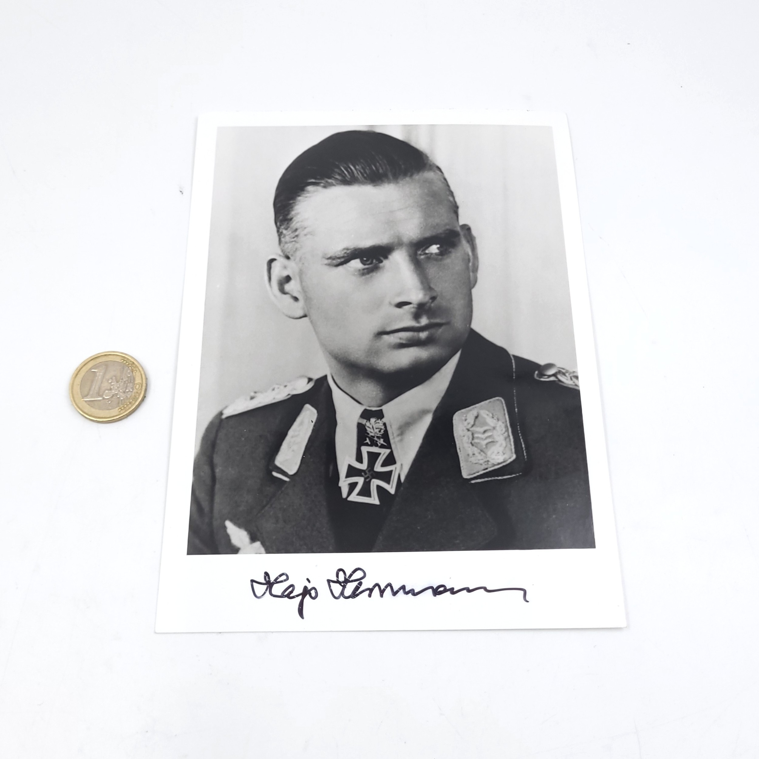 An officially certified hand signed military portrait photograph of ...