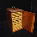 A handsome vintage coin collectors mahogany cabinet. Features thirteen ...