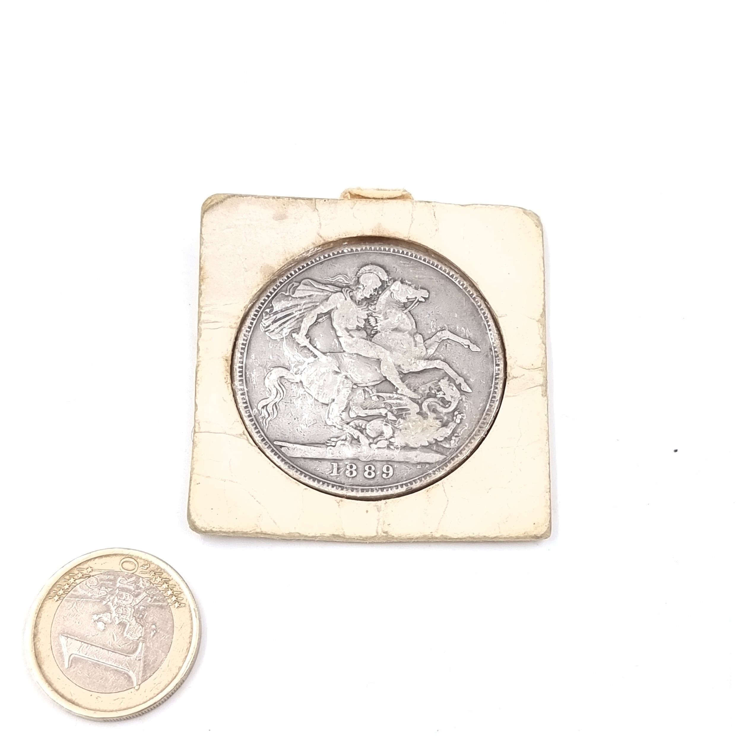 A 1889 Sterling Silver Crown Coin Queen Victoria.