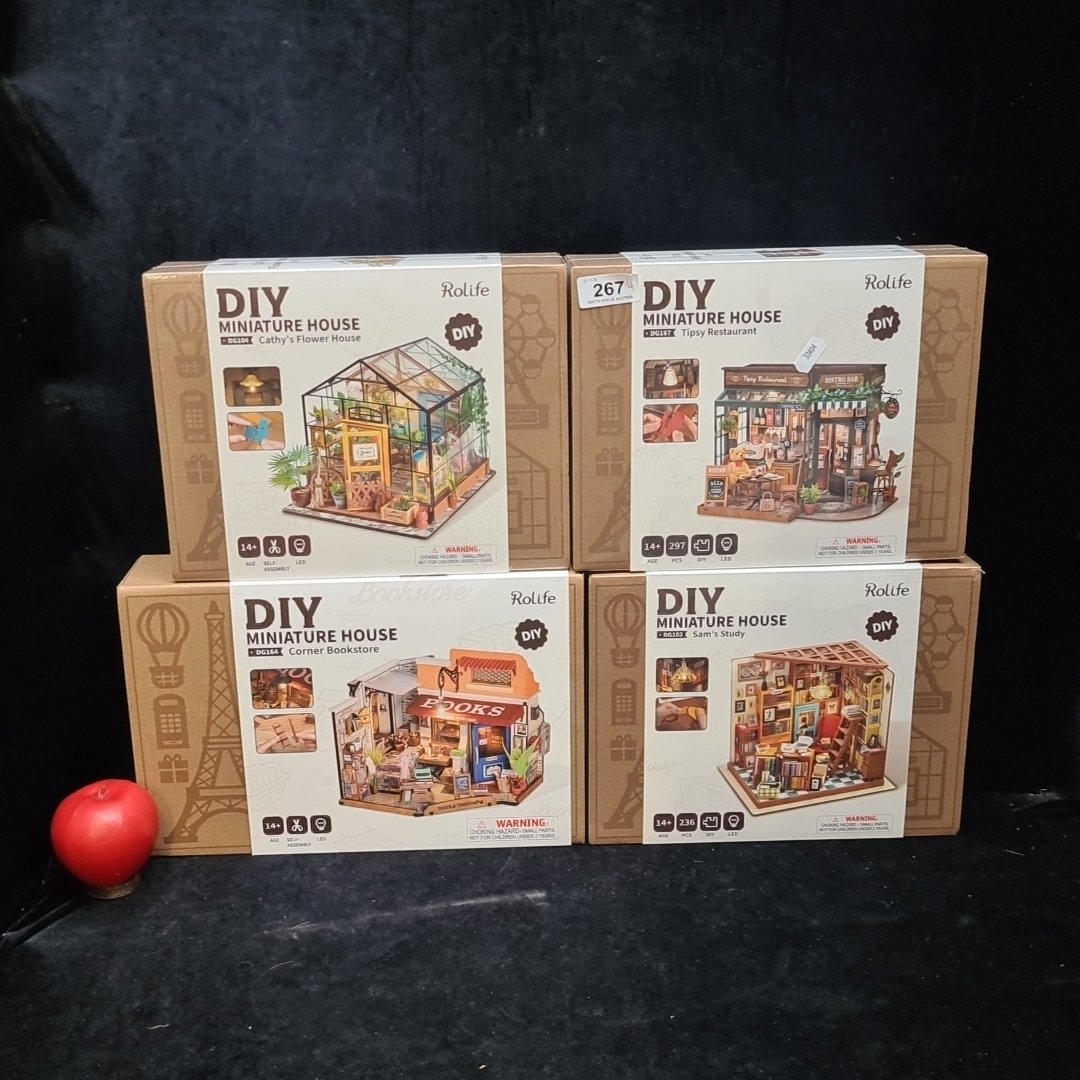 A group of 4 brand new boxed Rolife DIY miniature house kits ...