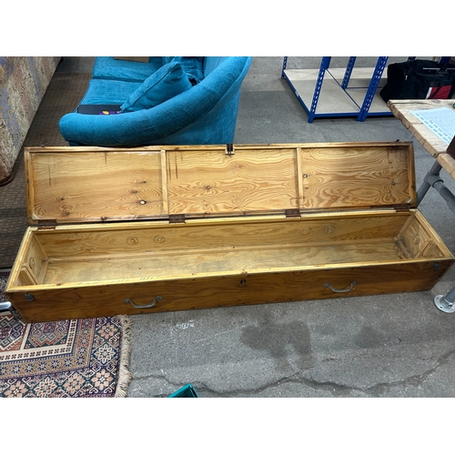 114 - Very large vintage pine equipment case with fastening hinged lid, 29cm high, 197 x 36cm