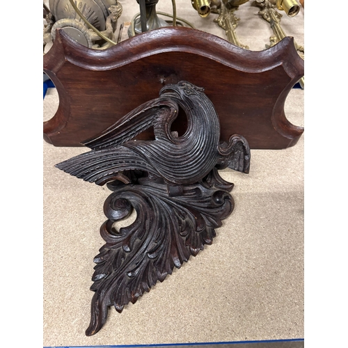 211 - 19th century carved hardwood wall bracket, decorated with stylised eagle, scrolling mounts (AF) 38 x... 