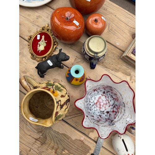 56 - Mixed decoration lot to include mottled art glass bowl, oversized graduating ceramic apples, etc