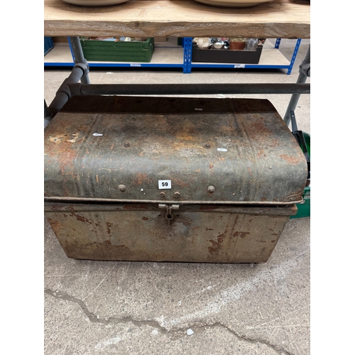 59 - Old domed trunk containing a collection hand tools, brass door knockers, door furniture etc