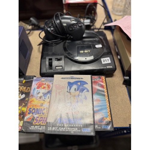 217 - Sega Mega Drive console, controller, and three Sonic games