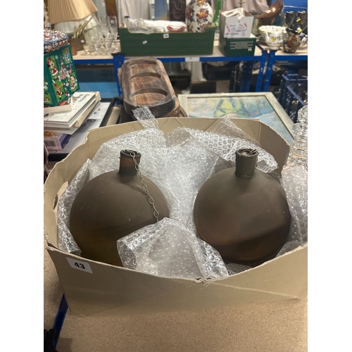 43 - Pair of weathered ceramic ‘witches balls’ (2)