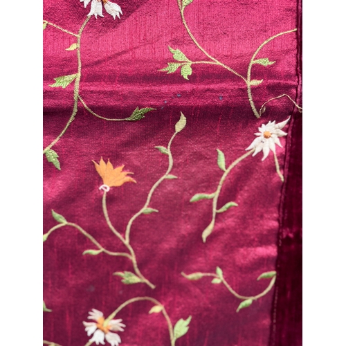 25 - Good quality eastern embroidered silk work throw together with a pair of similar smaller panels (pil... 
