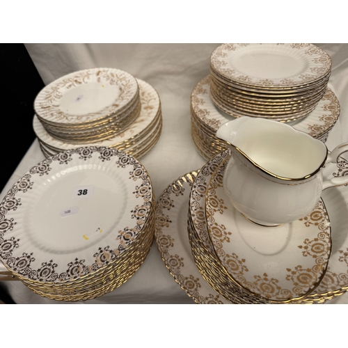 38 - Quantity of Paragon and other white and gilt bordered porcelain dinner wares (75 pieces approx)