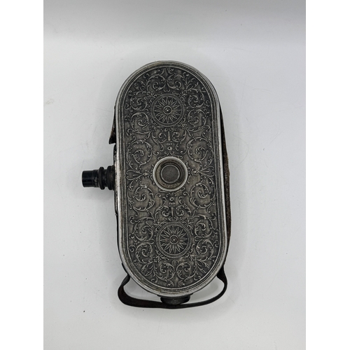 48 - Unusual Bell and Howell Filmo Model no. 75 model automatic cine-camera, associated leather case