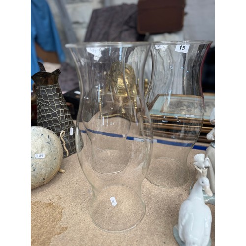 15 - Three tall clear glass storm lanterns, 36cm high (3)