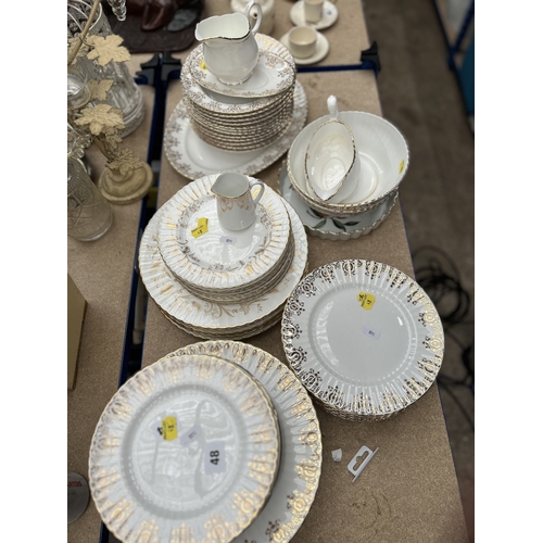 44 - Quantity of Paragon and other white and gilt bordered porcelain dinner wares (75 pieces approx)