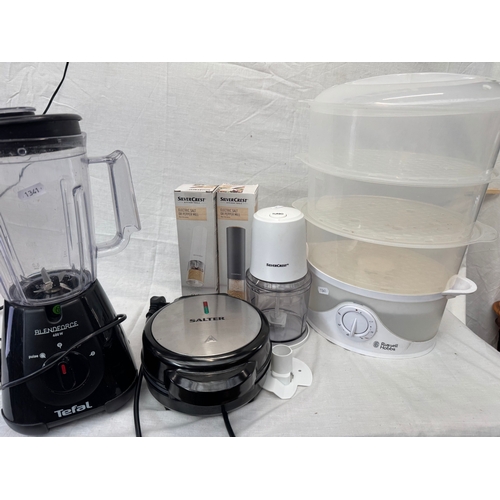 58 - Contemporary kitchen effects to include steamer, omelette maker, food processors etc