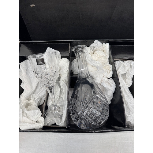 9 - Boxed Royal Doulton crystal wine service comprising decanter and four wine glasses