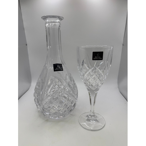9 - Boxed Royal Doulton crystal wine service comprising decanter and four wine glasses